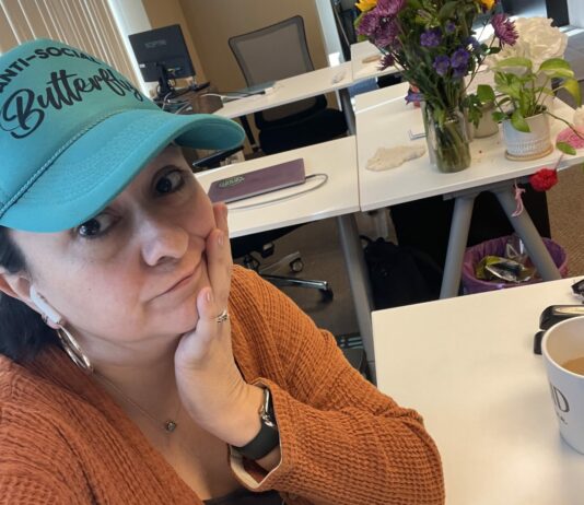 Finding Your Zen: Juggling Work and Self-Care, Mompreneur Style! picture of me in the office with no one around
